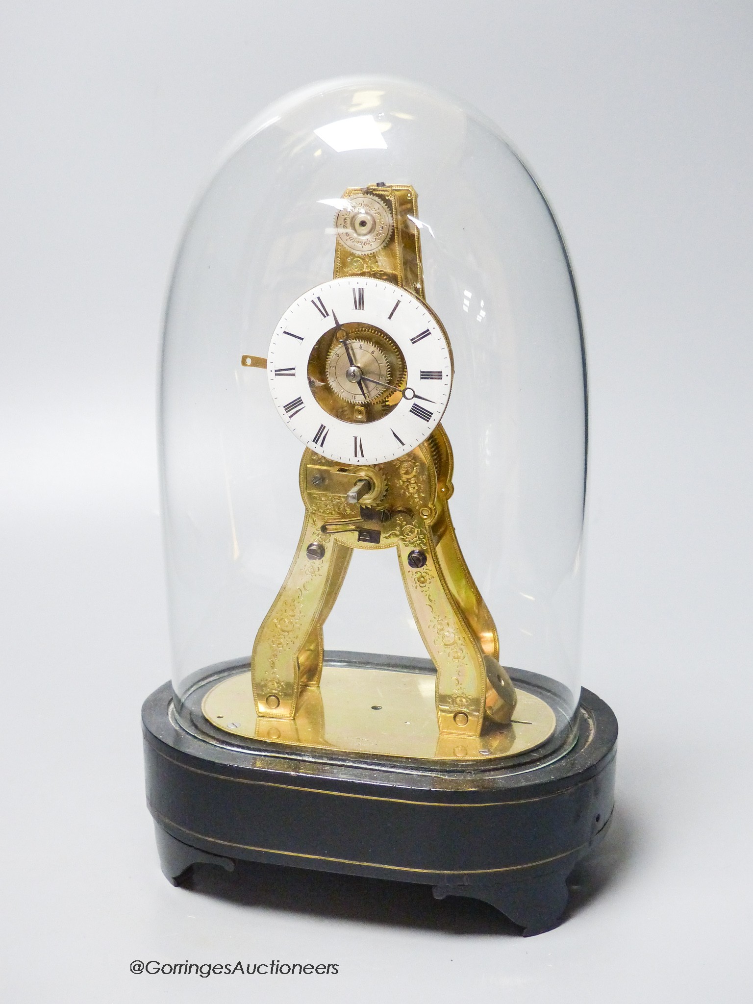 A 19th century French brass skeleton clock, signed MS.Honoraeles Exp. Paris Londres, with alarm disk and pull repeat, under dome, overall height 26cm